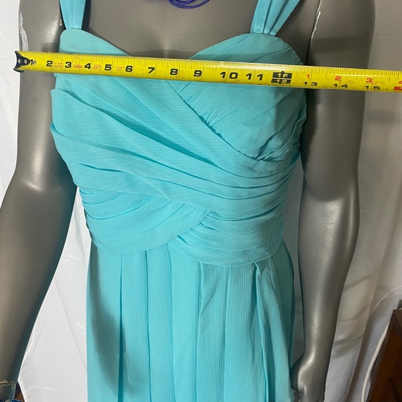 David’s Bridal Chiffon dress in aquamarine colour
Size 16 - Picture 4 of 5